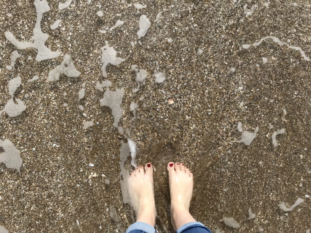 Füße am Meer